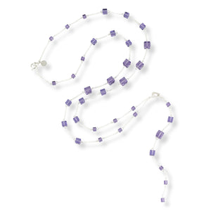 Long, versatile necklace made with sterling silver and tanzanite purple Swarovski cubed crystals.  Chain and clasps are sterling silver.