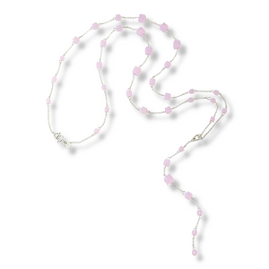 Long, versatile necklace composed of Swarovski crystals in a powdery, airy, light pink color and cube shape. Chain and clasp are sterling silver.