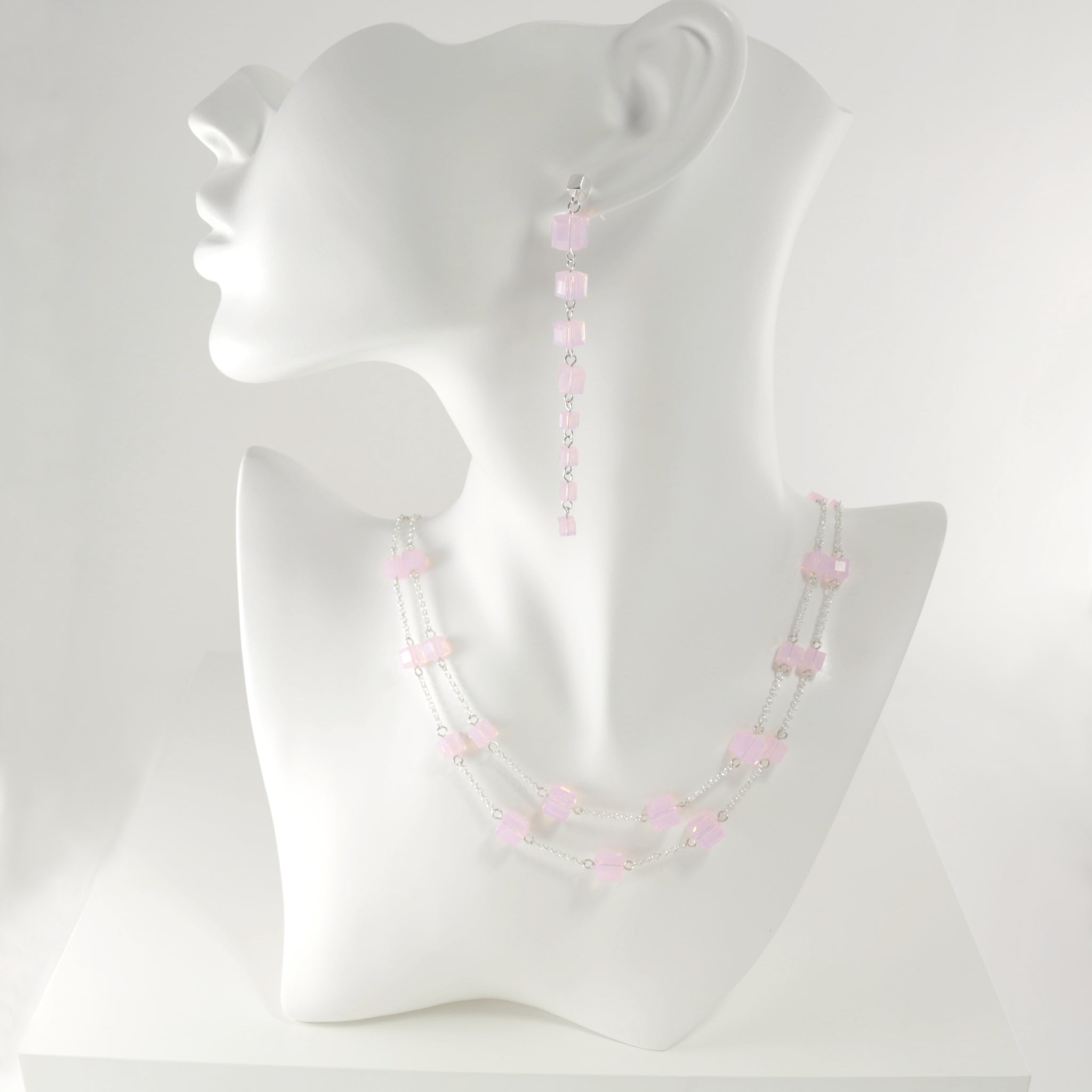 Earrings and necklace set containing milky powder light pink cubed Swarovski crystals and sterling silver 