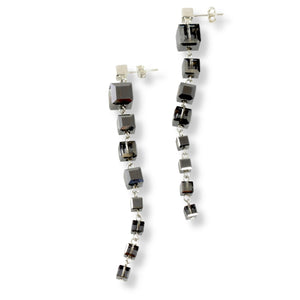 Sparkly and shiny cube crystal earrings composed of eight dark silver colored Swarovski crystals and sterling silver