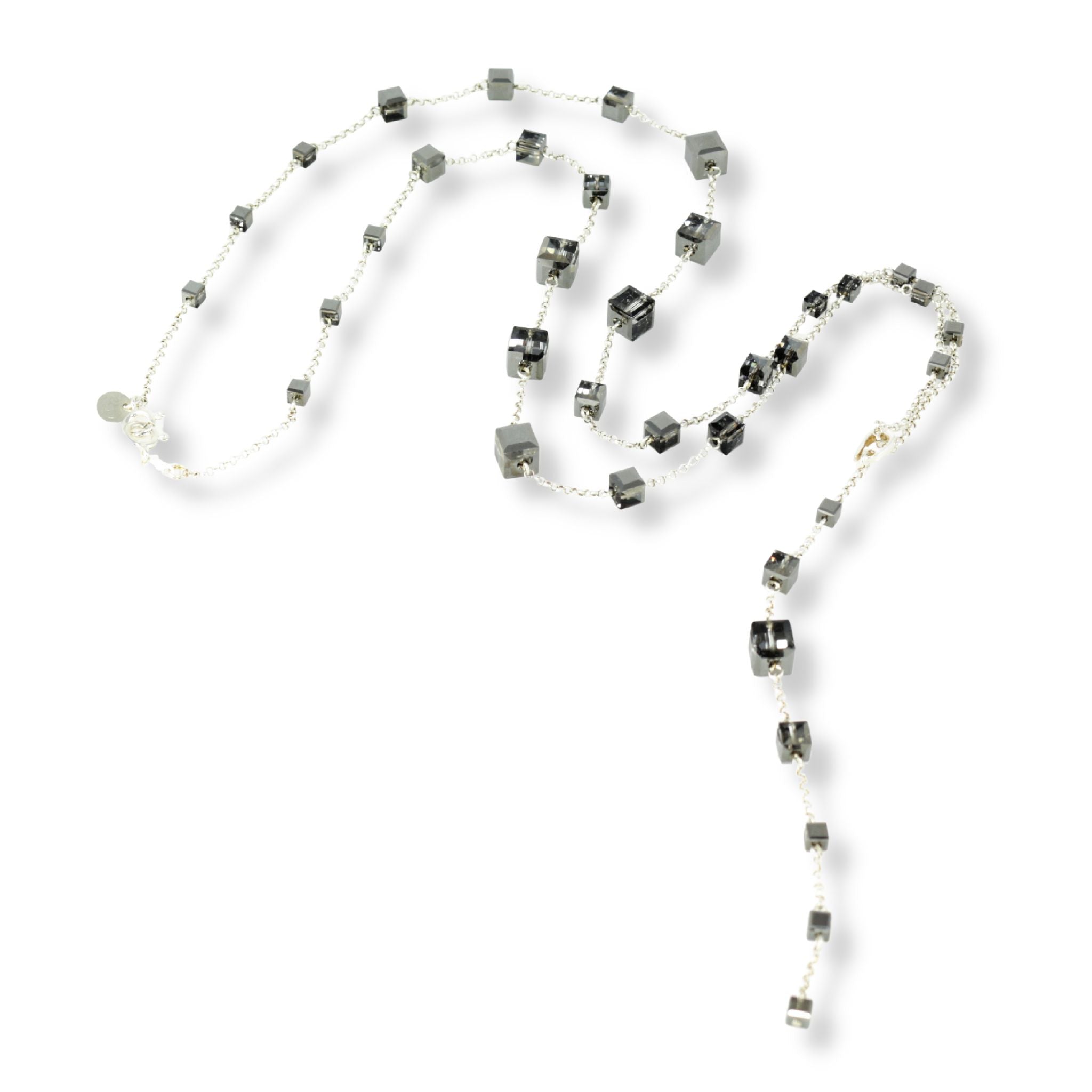 Long, versatile necklace with removable pendant. Consisting of a sterling silver chain and clasps, accompanied by several dark, shiny grey Swarovski cubed crystals 